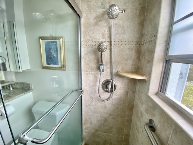 bathroom with tiled shower