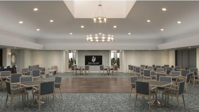 dining space featuring hardwood / wood-style floors and a chandelier