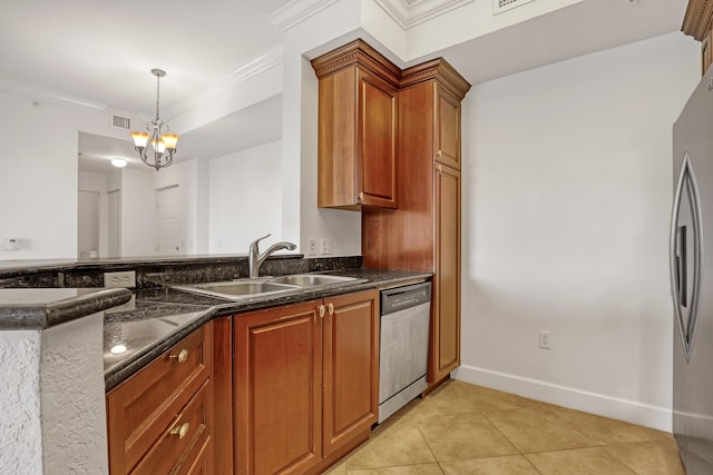 kitchen with appliances with stainless steel finishes, pendant lighting, sink, ornamental molding, and light tile patterned floors