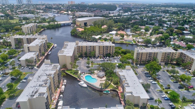 birds eye view of property featuring a water view