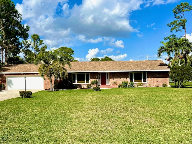 single story home with a garage and a front yard