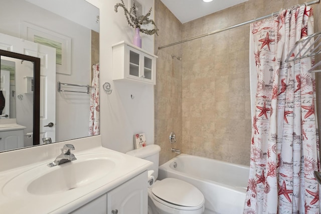 full bathroom with vanity, toilet, and shower / bath combo with shower curtain