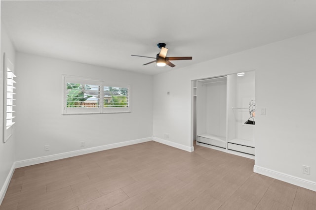 spare room with ceiling fan