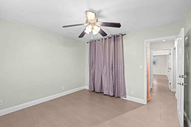 spare room featuring ceiling fan