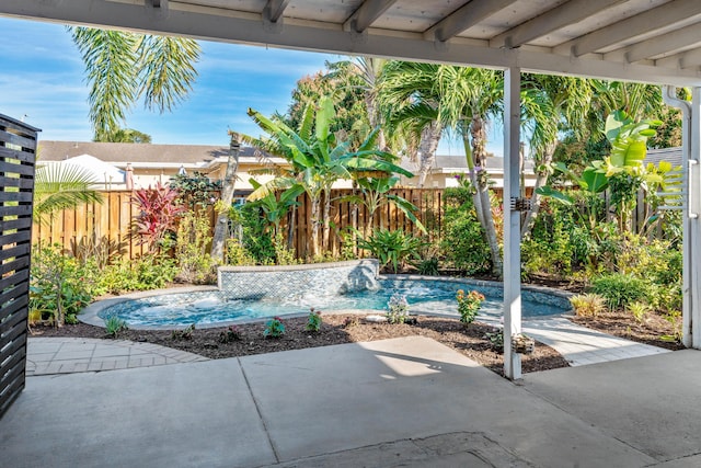 view of pool featuring a patio area