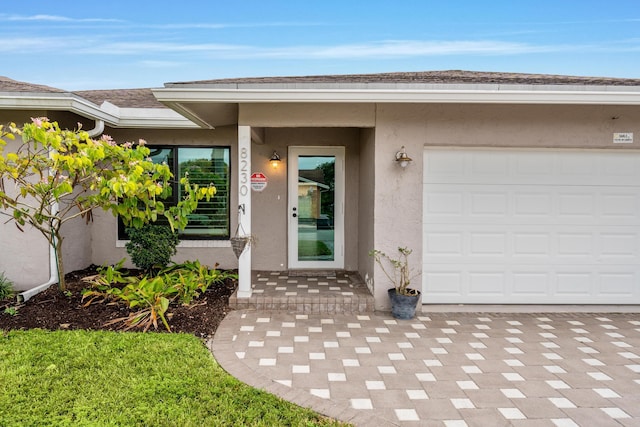 property entrance featuring a garage