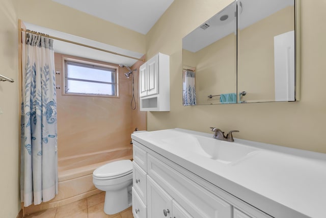 full bathroom featuring vanity, shower / tub combo, tile patterned floors, and toilet