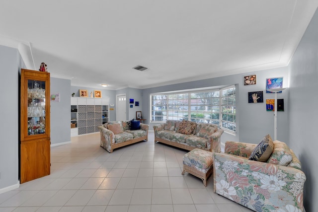 tiled living room with crown molding