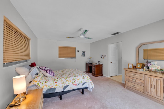 carpeted bedroom featuring ceiling fan