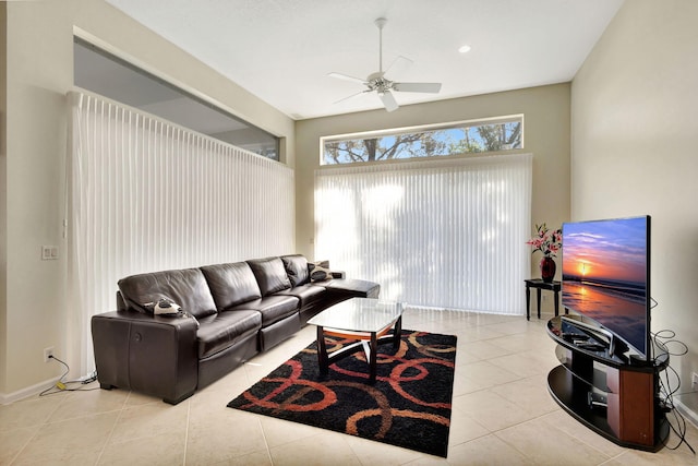 living room with light tile patterned flooring and ceiling fan