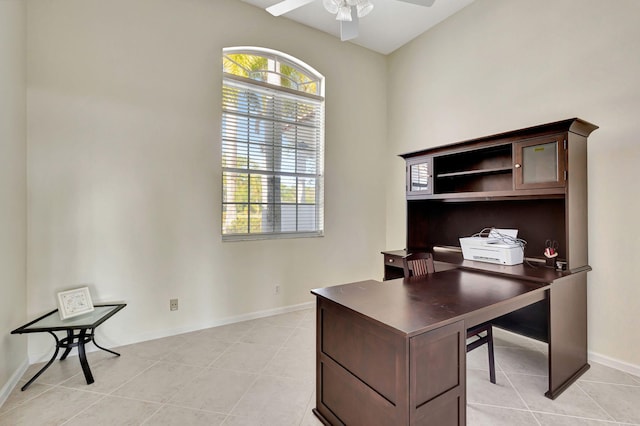 tiled home office with ceiling fan