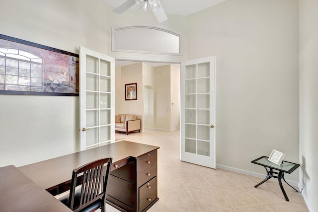 office space featuring french doors, ceiling fan, and light tile patterned flooring