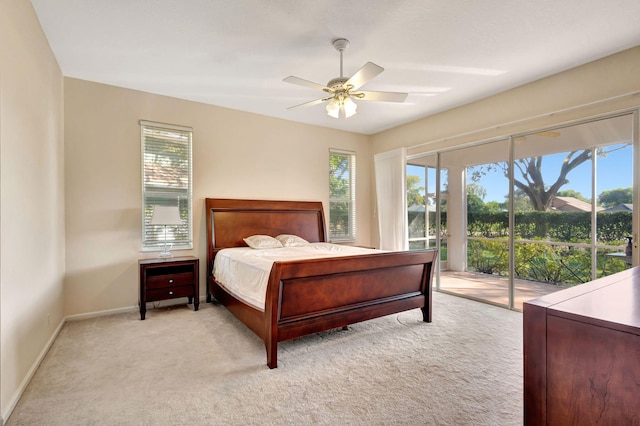 bedroom with light carpet, access to outside, and ceiling fan