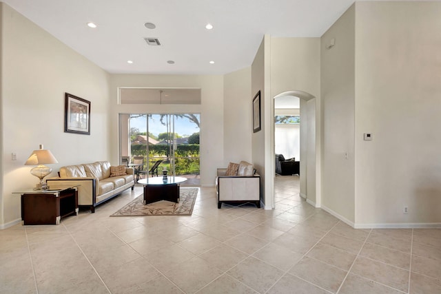 living room with light tile patterned floors