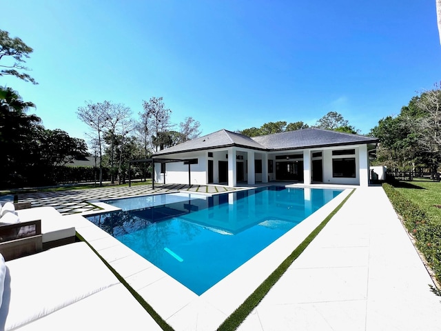 outdoor pool with a patio