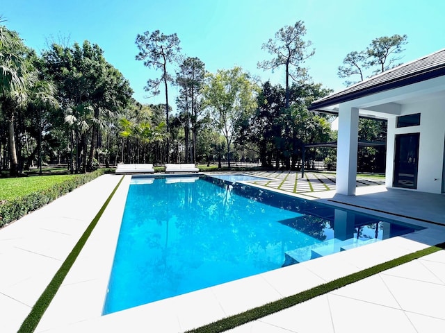 pool with a patio