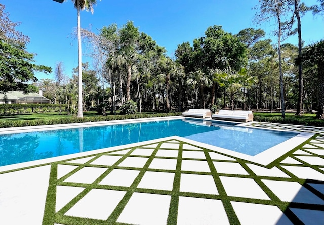 pool with a patio