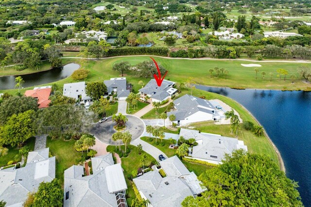 view of front facade with a garage and a front lawn