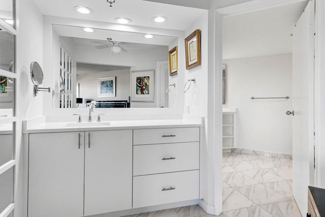 bathroom with vanity and ceiling fan