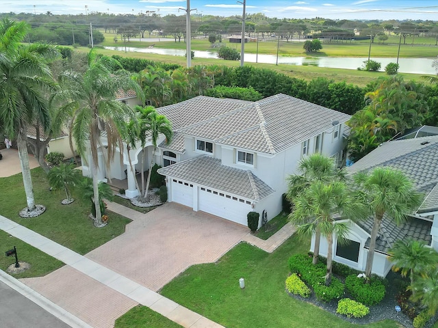 drone / aerial view with a water view