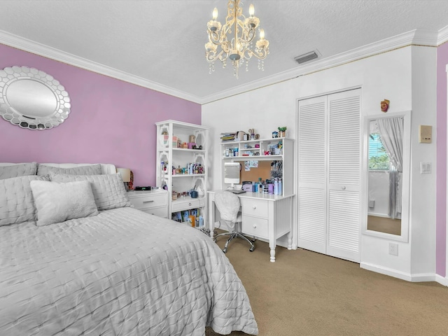 carpeted bedroom with ornamental molding, an inviting chandelier, a textured ceiling, and a closet