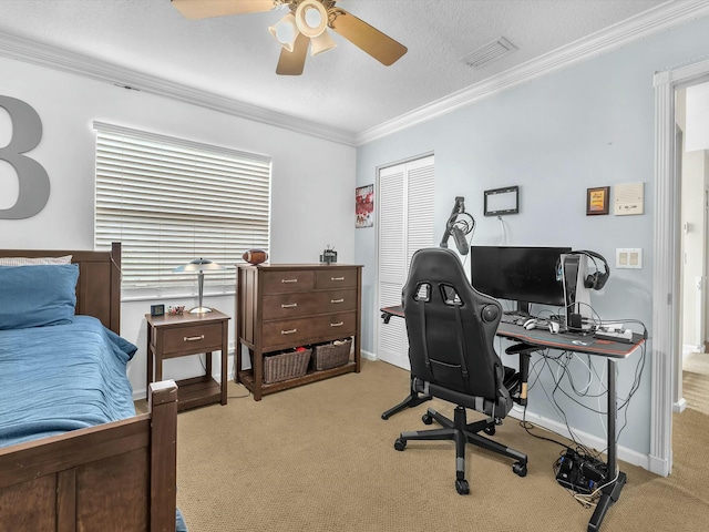 office space featuring crown molding, light colored carpet, a textured ceiling, and ceiling fan