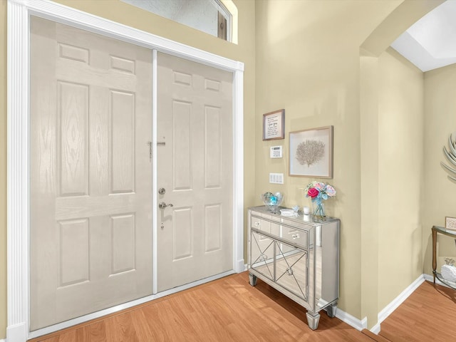 entrance foyer featuring hardwood / wood-style floors