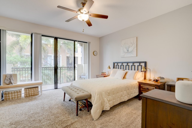 carpeted bedroom featuring access to outside and ceiling fan