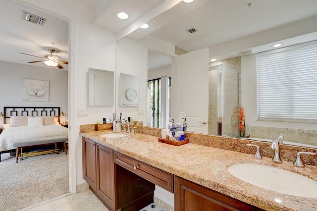 bathroom with vanity, an enclosed shower, tile patterned flooring, and ceiling fan