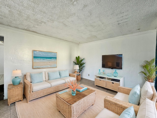 living room featuring tile patterned flooring, ornamental molding, and a textured ceiling