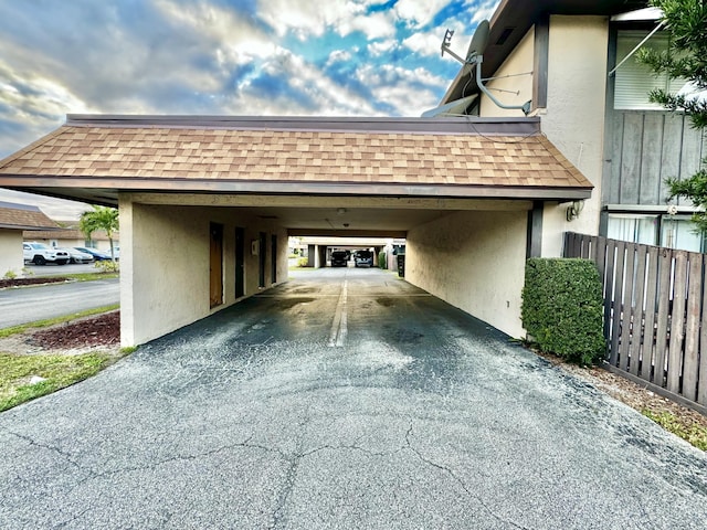 garage with a carport