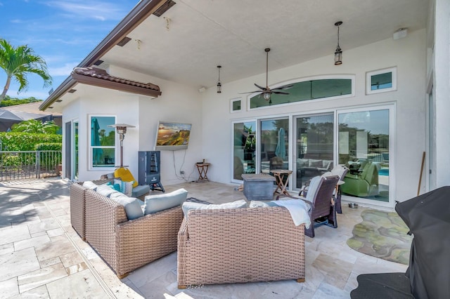 view of patio / terrace featuring ceiling fan and outdoor lounge area