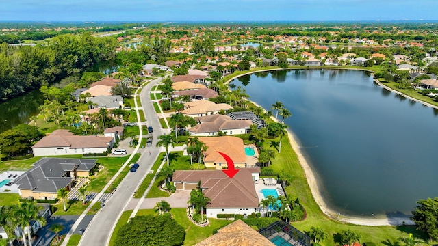 bird's eye view with a water view