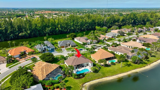 drone / aerial view featuring a water view