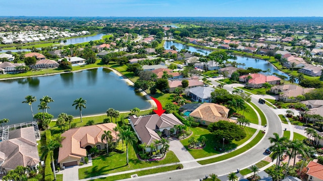 drone / aerial view with a water view