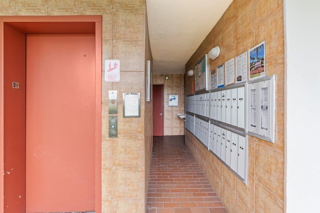 view of property's community with mail boxes