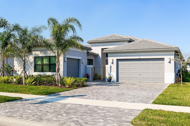 view of front of property with a garage