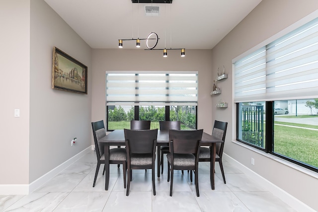 dining space featuring a wealth of natural light