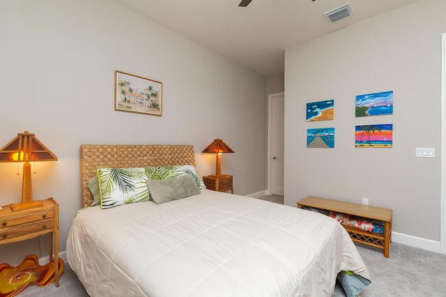 bedroom with light carpet and ceiling fan