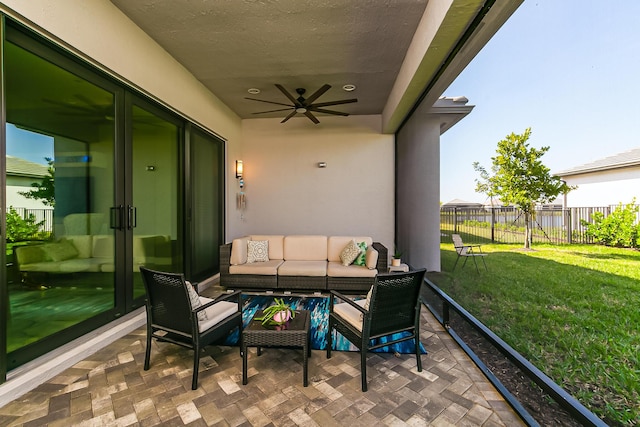 view of patio with ceiling fan and an outdoor hangout area