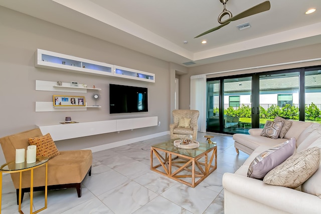 living room with ceiling fan