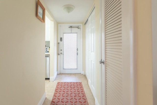 hallway with light tile patterned flooring