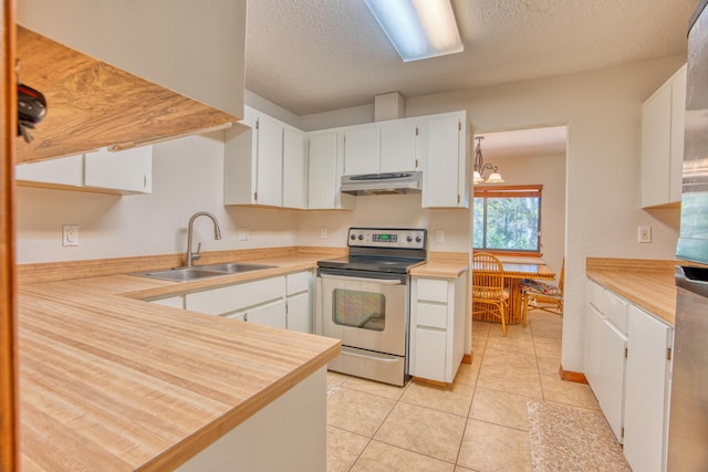 kitchen featuring a sink, light countertops, stainless steel range with electric stovetop, under cabinet range hood, and white cabinetry