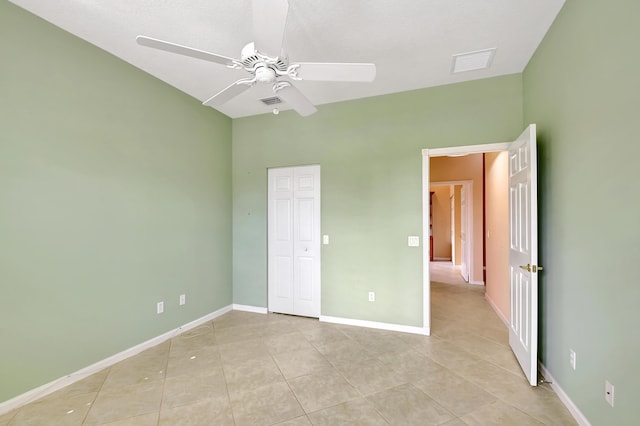 empty room featuring ceiling fan, hardwood / wood-style floors, and a textured ceiling