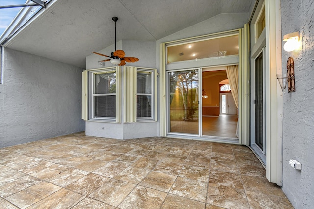 unfurnished room with light tile patterned floors and ceiling fan