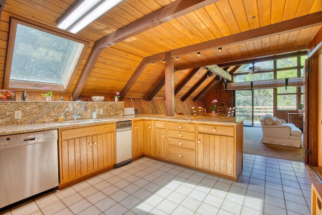 kitchen with light tile patterned flooring, dishwasher, a peninsula, and a sink