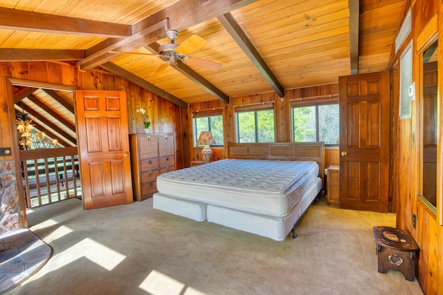 carpeted bedroom featuring wood walls, wooden ceiling, and vaulted ceiling with beams