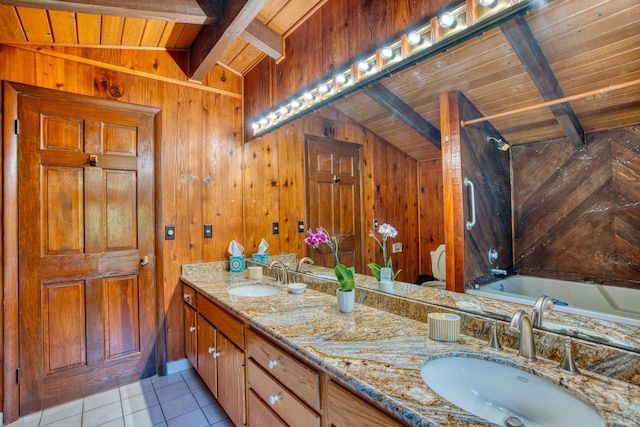 full bath featuring a sink, lofted ceiling with beams, wood walls, and double vanity