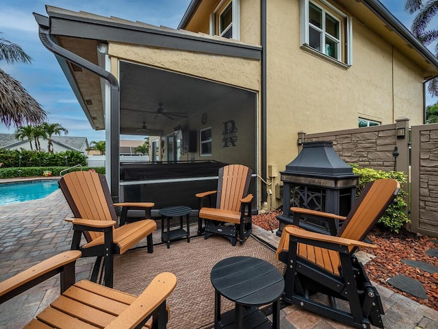 view of patio with ceiling fan