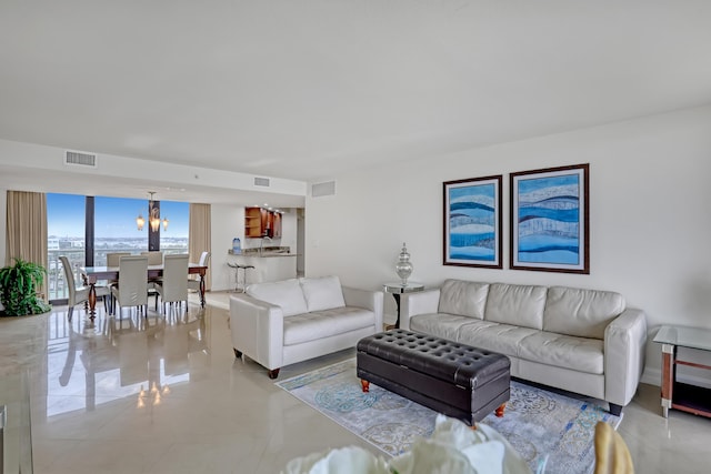 living room featuring a chandelier